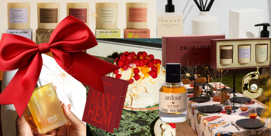 A collage of festive gifts and home décor items, including candles, perfume, body oil, and tableware, set against a backdrop of a holiday table setting.